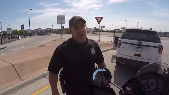 Police officer on phone